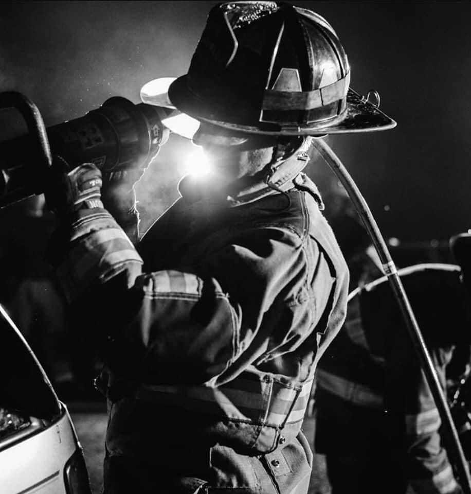 firefighter with a black and white screen affect
